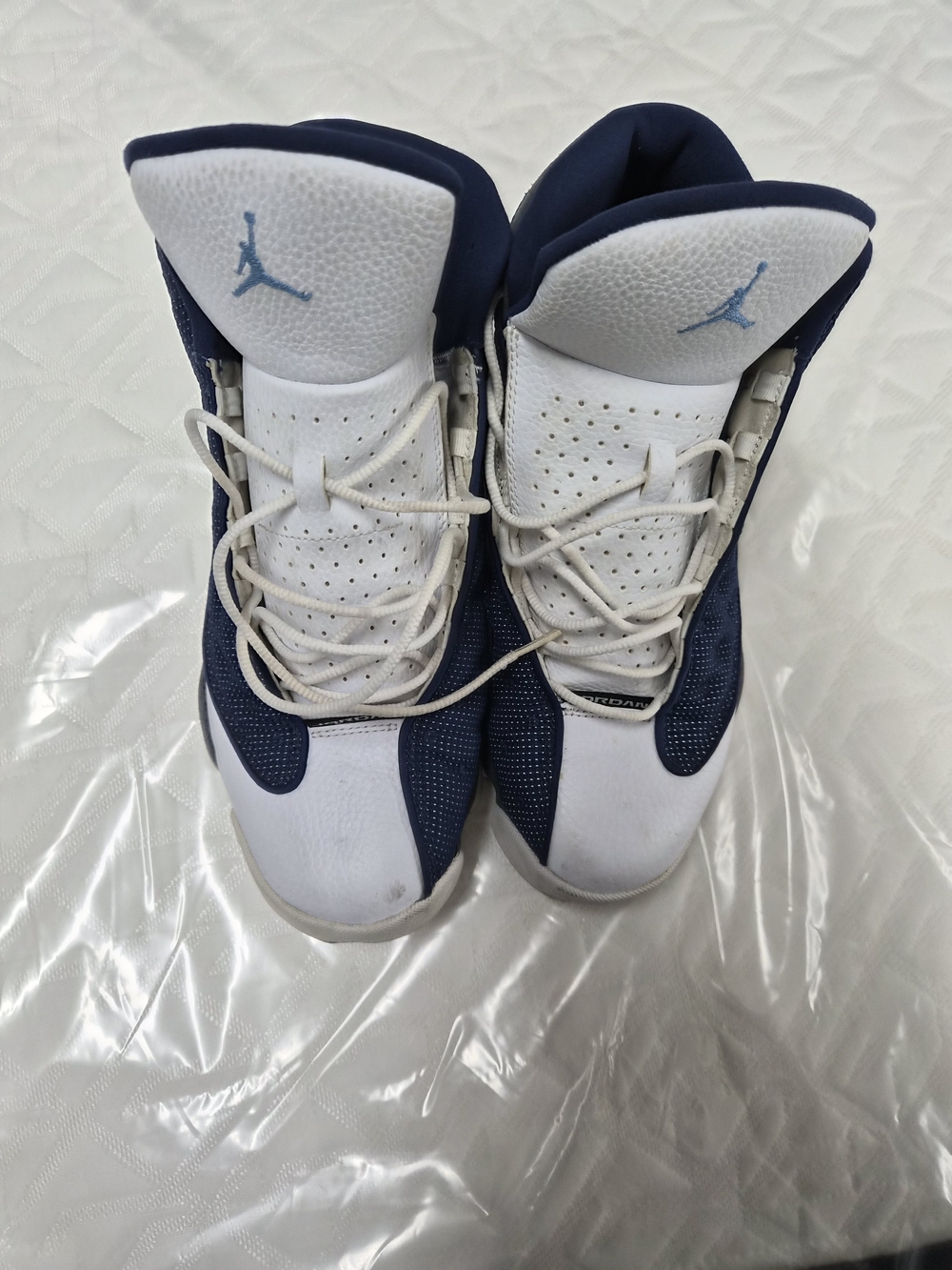 Nike Air Jordan Retro Fint Sneakers in White & Navy